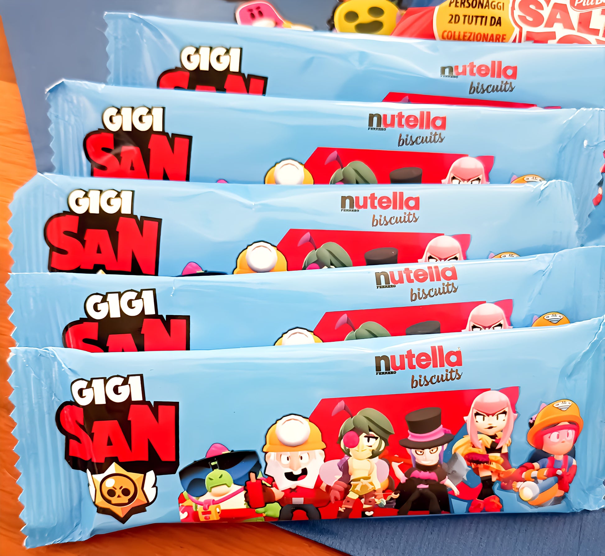 Gigi San Nutella Biscuits packets with colorful cartoon characters on blue wrappers.