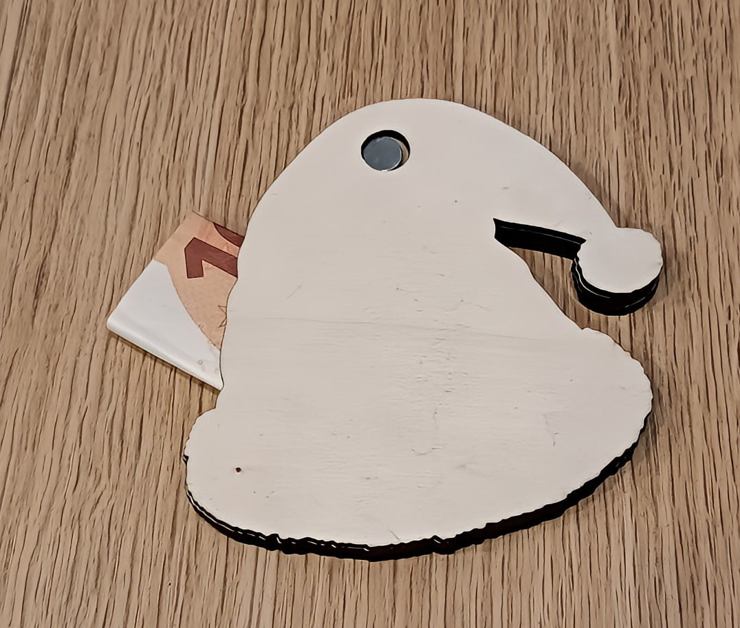 Santa hat-shaped wooden card holder with euro note on wooden table