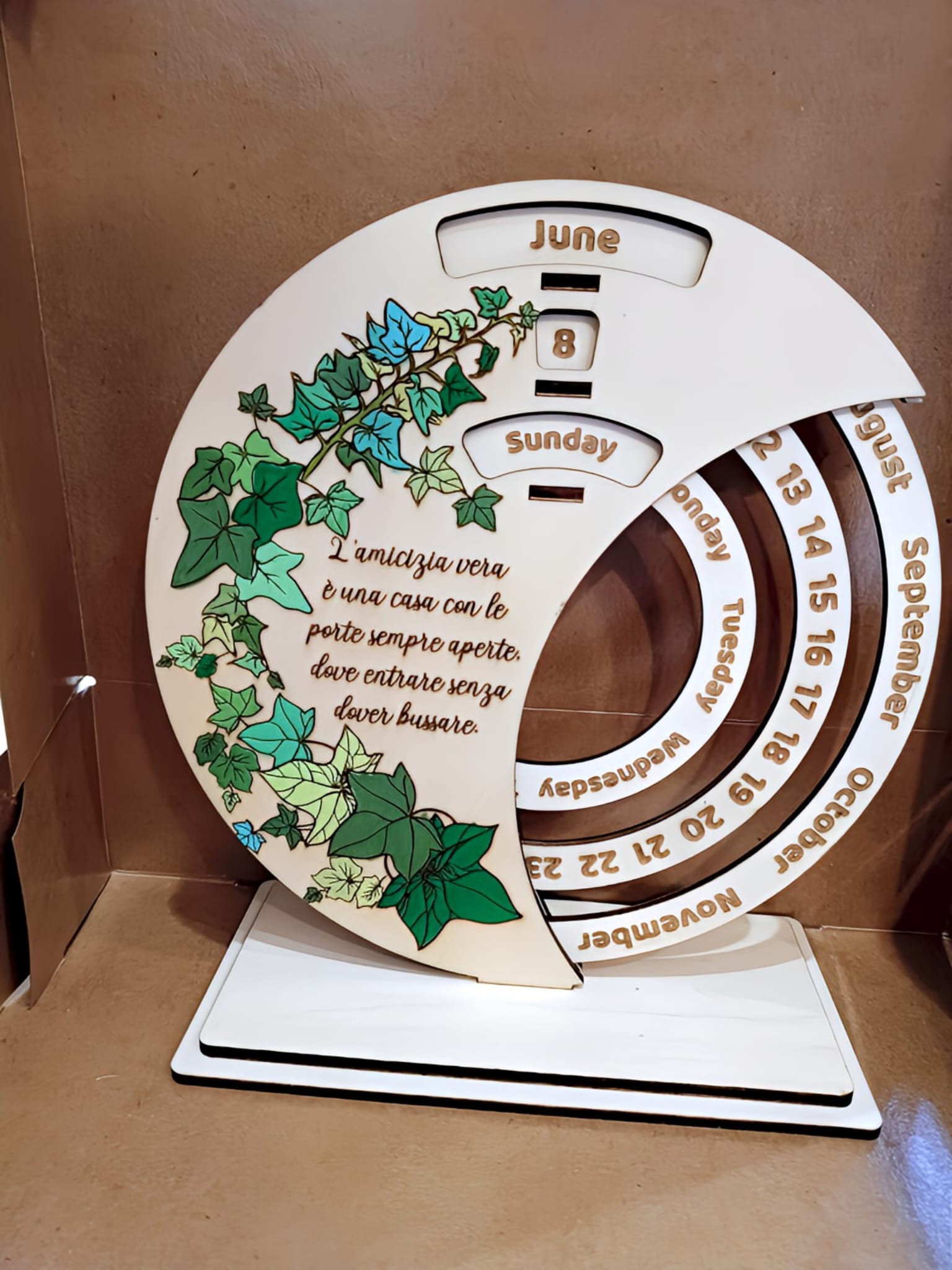 Wooden perpetual calendar with green ivy design, Italian friendship quote, June 8 Sunday displayed